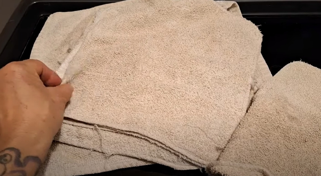 Dingy white cotton rags after washing with regular laundry detergent